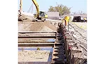 Welders cut braces