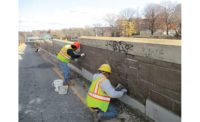 replacing stones in Union Turnpike retaining wall