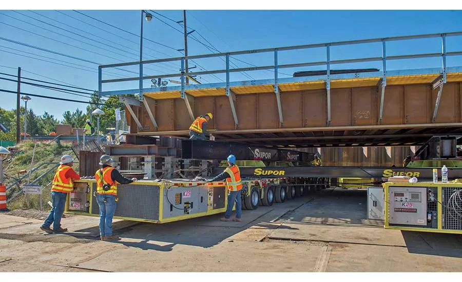 Workers roll in the bridge