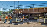 Workers roll in the bridge