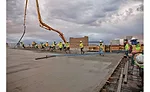 Workers place concrete