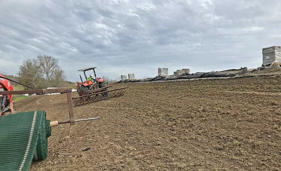 Crews even out soil