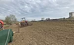 Crews even out soil