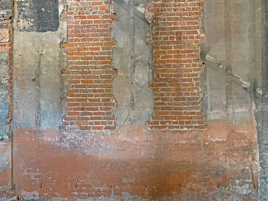 existing brick and plaster walls