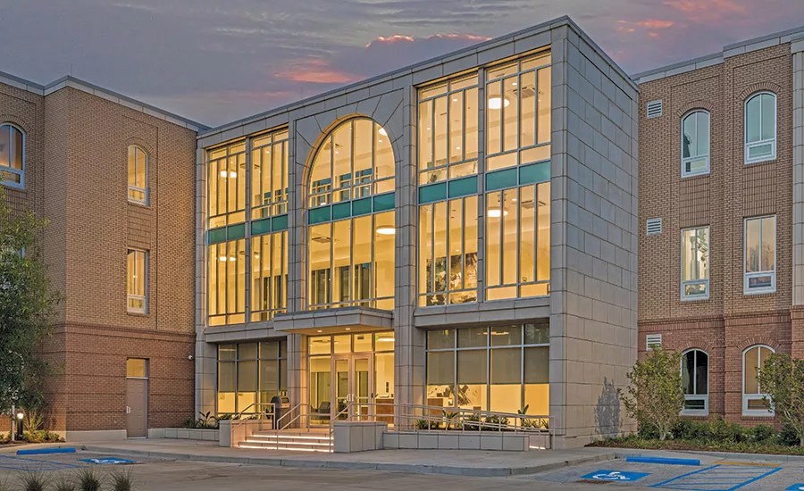 Poydras home expansion and renovation