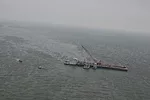 Ship and Oil Barge Collide in Houston Ship Channel, Spilling 168,000 Gal of Oil Into Texas Waters