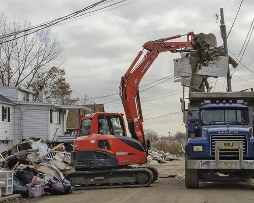 Clearing Out Superstorm's Soggy Mess