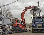 Clearing Out Superstorm's Soggy Mess