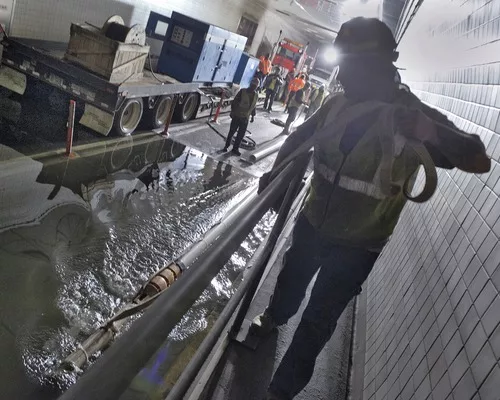 Clearing Out Superstorm's Soggy Mess