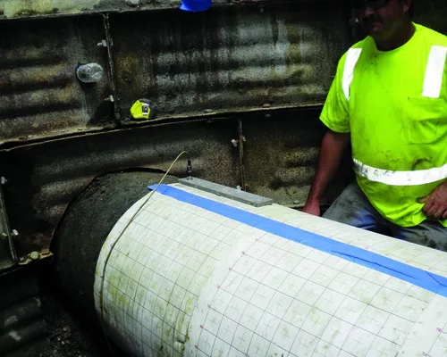 Broadband Electromagnetic Scanning Reveals The Inner Secrets of a Pressurized Sewer Line