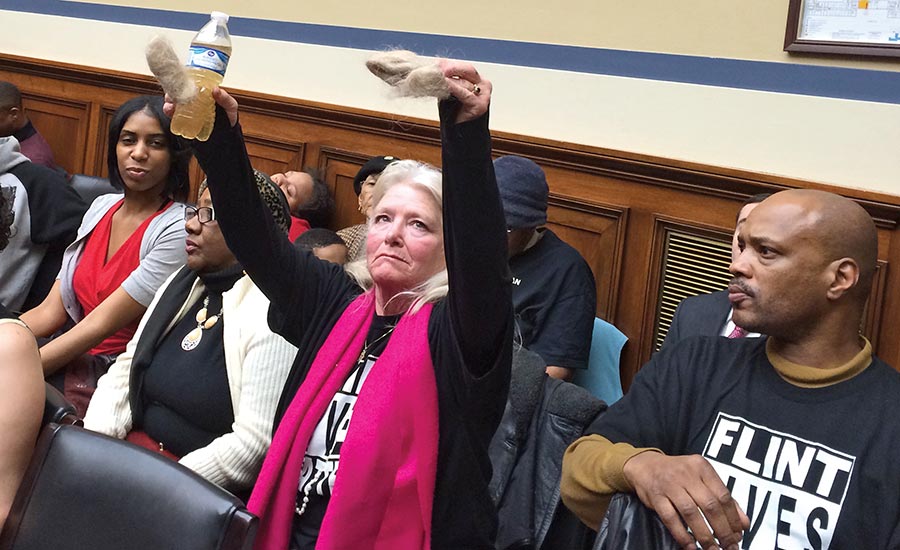 Flint protestors at congressional hearing