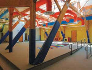 The attic of the historic school is once again a place for children, designed as a colorful, safe play loft for kids at The Children’s Center.