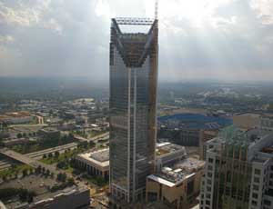 The Duke Energy Center tower has topped out and the developer, Wachovia, owned by Wells Fargo & Co., anticipates an on-schedule finish later this year. 