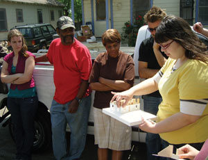 Members of bcWORKSHOP and its partners in one of its neighborhood revitalization initiatives hold a design meeting in Dallas.