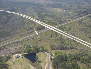 The image shows the same section of U.S. 1, along with a rendering of the proposed interchange.