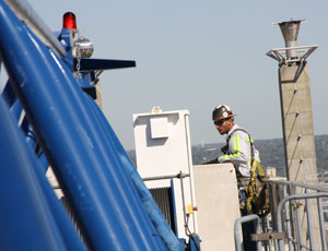 Hague checks the counterweights on a Linden Comansa crane erected at the Kauffman Center for the Performing Arts in Kansas City.