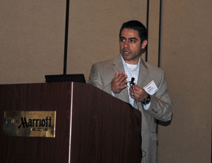 Fred Cardenas, virtual design and construction manager for Austin Commercial, address the conference in Las Colinas.