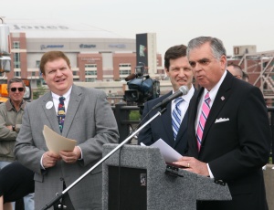 U.S. Secretary of Transportation Ray LaHood addresses a large gathering at the groundbreaking for the new Mississippi River Bridge in St. Louis. Also pictured is Missouri Department of Transportation Secretary Pete Rahn, far left. 