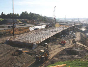 The first step in the Nalley Valley project was to construct temporary structures such as this eastbound SR 16 bridge to carry traffic over the valley during construction of the new viaduct.