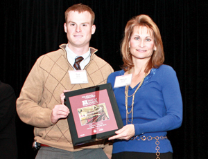 Ted Wolf (left) of Forrester Construction and Nancy Penn of CH2M Hill accept an Award of Merit in the Cultural category for the Ford’s Theatre National Historic Site project.