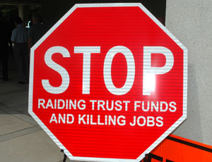 This "road sign" conveyed FTBA's stance on raiding road funds to balance the state budget.