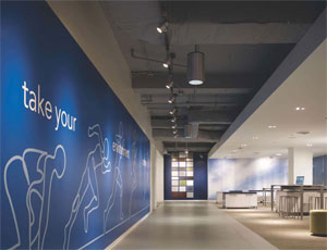 Companies are creating positive working spaces that reflect their cultures and brands. Above, an HOK-designed project provides an example of branding, where a company builds a space that sends a certain message to its employees and visitors.