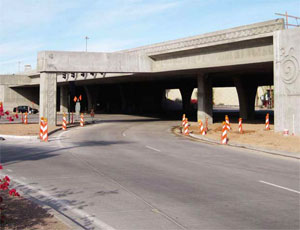The overpass at 44th Street is just one of many bridges that had to be extended to accommodate the additional lanes. Challenges included managing heavy traffic loads, scheduling to minimize impact to local businesses (such as hotels) and even gently coercing cliff swallows from their nests underneath bridges.