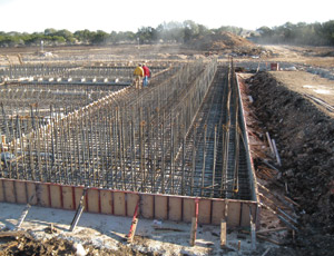 Pepper-Lawson is building the Brushy Creek Water Treatment Plant. Due to the size of the initial basin, crews poured segments of the first basin, then returned to pour the walls atop the mat.