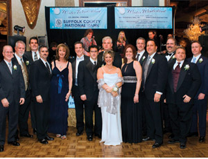 Pictured from left: Michael Costa, Partner at Armao, Costa & Ricciardi CPAs PC and CFK Board Member; Kevin G. Hamey, Principal of Stalco Construction and Chairman of CFK Executive Board; Frank Strcich, Principal of Omni Risk Management and CFK Board Member; Steve Levy, Suffolk County Executive; Natalie Weinstein, radio talk show host and President of Natalie Weinstein Design Associates; Honoree J. Gordon Huszagh, President and CEO of Suffolk County National Bank; John M. Grillo of JAG Architecture, CFK Board Member; Steven Kazanecki of Deep Blue Construction, CFK Board Member; Carol Donato, Stalco Constriuction Office Manager and CFK Secretary; Allison Ray of East Coast Capital Corporation, CFK Board Member; Troy Caruso of Diversified Construction, CFK Board Member; Alan Nahmias, President and Principal of Stalco Construction and Vice Chairman of CFK Executive Board; Steven DeLuca, Suffolk County National Bank 1st Vice President and CFK Treasurer; William Ife, Principal William B. Ife Attorney at Law and CFK Board Member; Lou Spina of Atlynx Brokers, CFK Board Member.