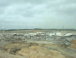Remains of the play: Rubble and debris from the Dallas Cowboys former home, Texas Stadium, required more than a ton of explosives to bring it down. Much of the concrete and steel will be recycled.