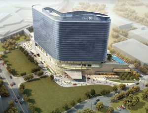 ABOVE: A rendering of the new 1.14-million-sq-ft Dallas Convention Center Hotel, which Balfour Beatty is building to meet LEED-silver certification.