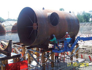 Massive Materials The Cat/Del project includes large quantities of large materials, including this 12-ft-diameter steel pipe. 