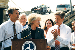 Peters delivered federal money to Minnesota officials after Minneapolis bridge failure.