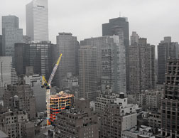 Marketing photo from construction-management firm shows tower crane last month. It fell after jump to 205 ft.