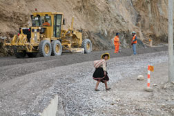 Crews work in harsh conditions and among locals.