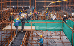 Foundation mat included a record 40,000-cu-m continuous pour that took 50 hours.