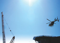 When air ambulances take off from or land at adjacent helipad, crane operations shut down for up to 20 minutes, reducing crane efficiency by 13%.