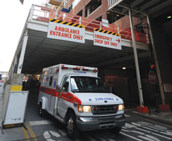 Roof of cover to protect ambulances is staging area.