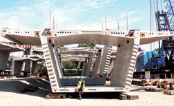 High-performance concrete segments comprise the I-35W bridge’s four box girders.