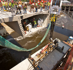 As many as six precast segments were placed in a day, with all 120 in place by August for the 504-ft-long main span.