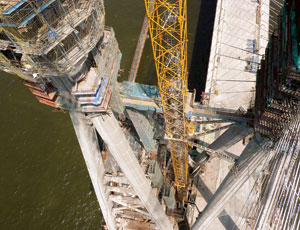 Two four-legged pylons lean together, creating a formwork challenge.