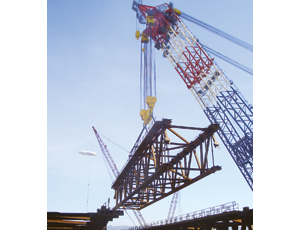 The muscular Left Coast Lifter can now begn to erect steel on the New Bay Bridge.