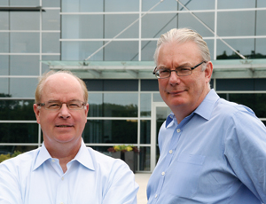 Founders Eichhorn (left) and Allin at Textura’s glassy home office in Deerfield, III.