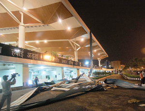 Investigators want to find out why new terminal roof section succumbed to wind.