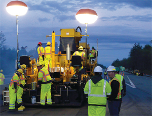 Pike Industries Inc. paving crew working on a New Hampshire ARRA-funded highway job; the state mobilized quickly to get projects ready.