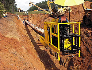 Pipeline installation: Boring Machine Works In the Trench