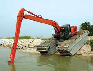 Amphibious excavator treads: Handles Soft Soils
