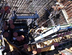 Crews often work at night or in early morning to avoid the desert heat, which can top 100&deg;F.