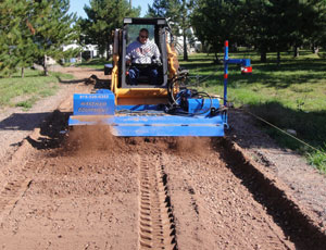 Keeping Level: Skid Steer Trimmer Attachment