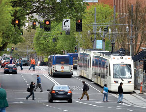 Observers say future urban light-rail projects, such as the existing system in Portland, Ore., and streetcar-line proposals will benefit from DOT’s policy shift on new transit starts.